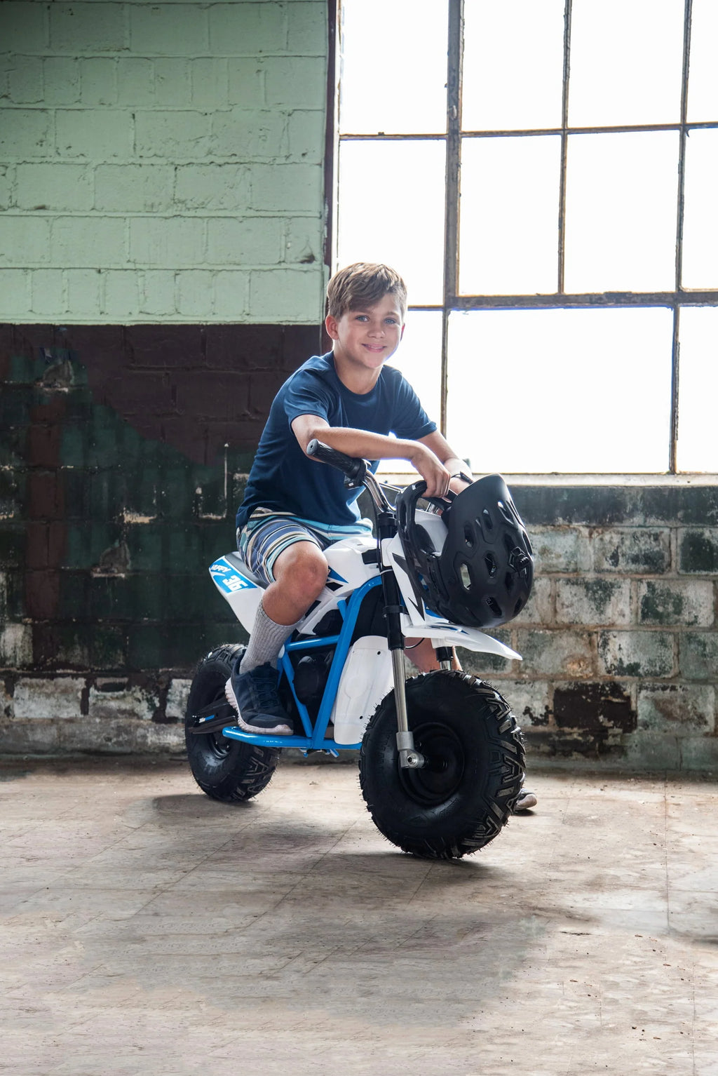Mini-moto électrique Huffy CR8-R 36 volts, blanche