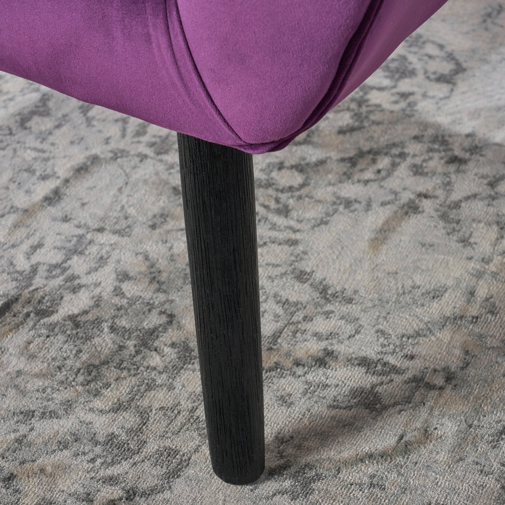 Fauteuil à oreilles en velours Noble House Simon, violet
