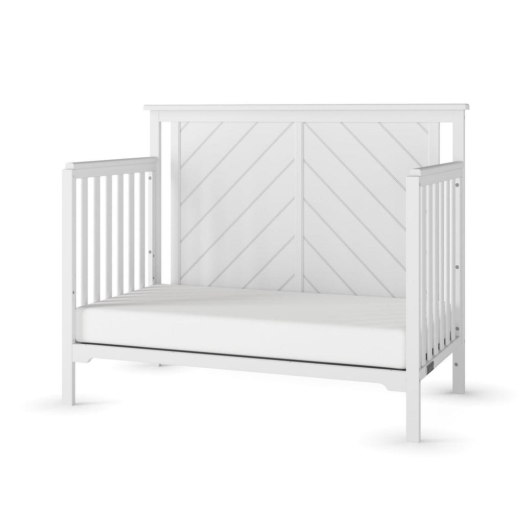 Lit convertible 4-en-1 Hampton de Child Craft. Panneau supérieur plat. 3 hauteurs de matelas. Blanc mat