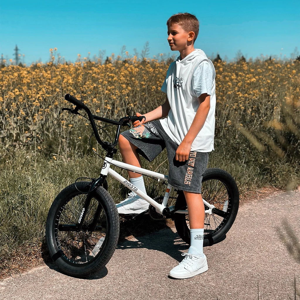 cubsala 20 Vélo BMX Freestyle pour enfants de 6 à 14 ans, garçons et filles, avec 4 cales, noir avec pneus rouges