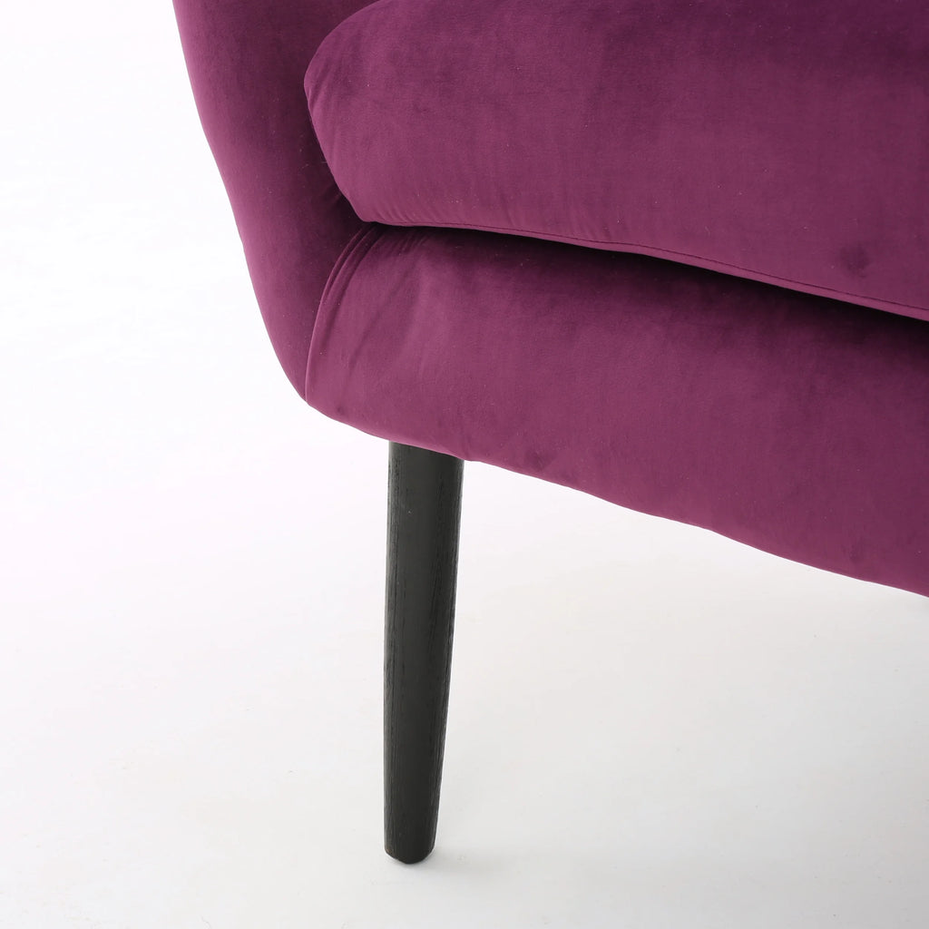 Fauteuil à oreilles en velours Noble House Simon, violet